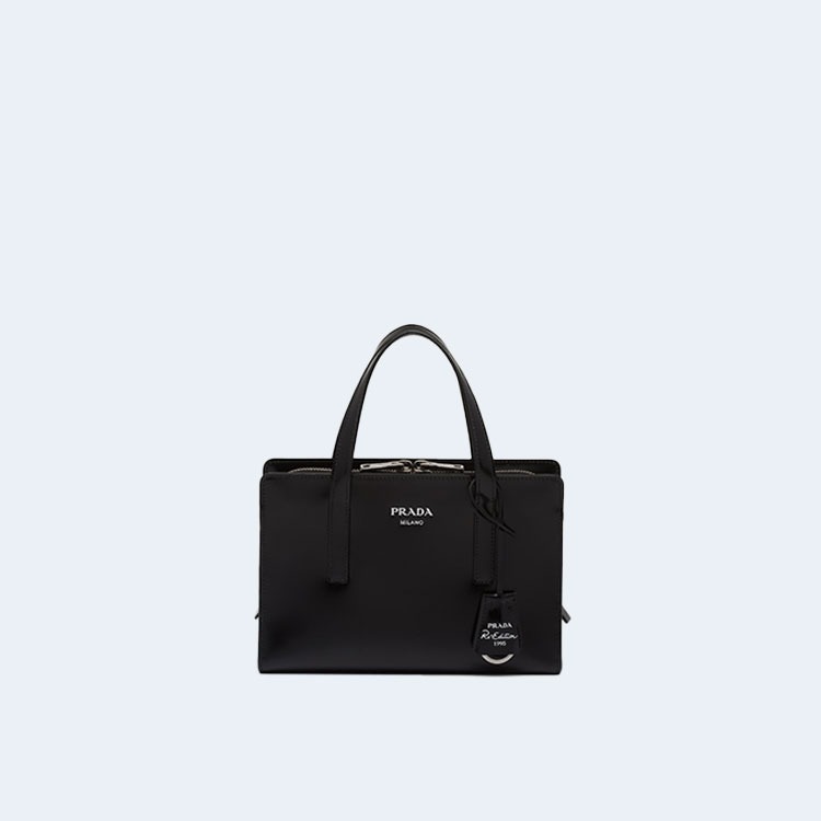 리에디션 1995 브러쉬드 레더 미니 핸드백 블랙